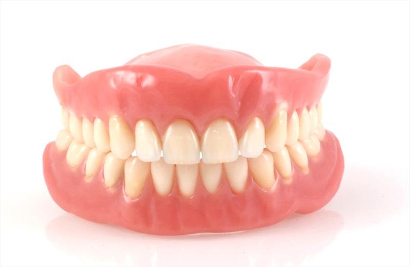 Complete Denture + Fix Crown (Rs.3000/tooth)